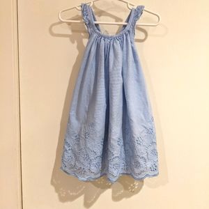 Blue sleeveless dress with bow back